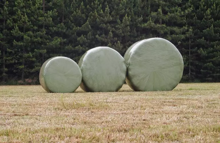 3 balers in the field