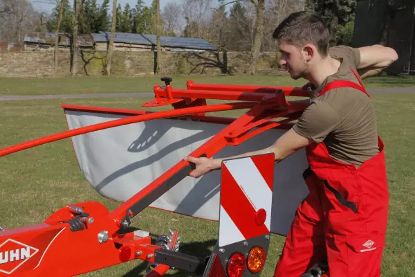 Déploiement facile de la toile à andain