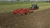 Le déchaumeur à dents HIGHLANDER au travail dans un champs